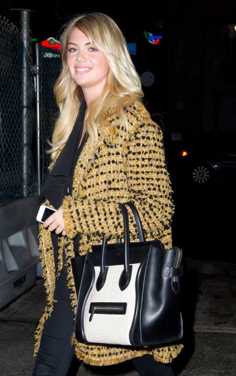 Charlize Theron is the Latest Star to Carry a New Louis Vuitton Lockit -  PurseBlog