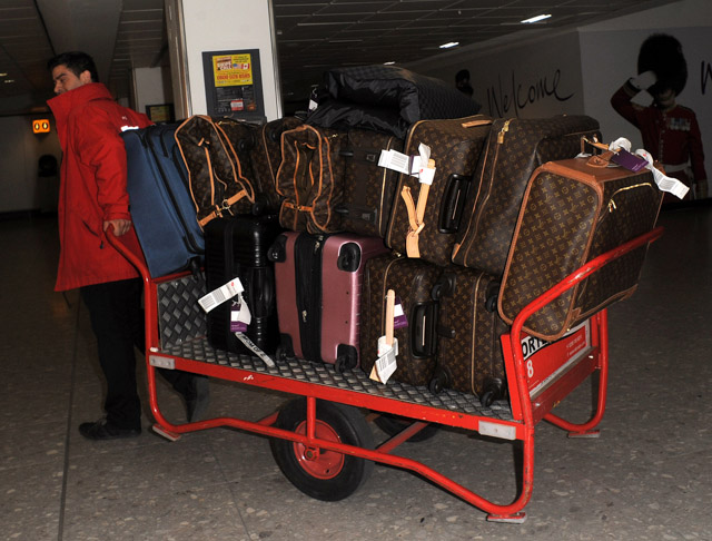 Check out how much Louis Vuitton luggage Kourtney Kardashian and fam  brought to London - PurseBlog