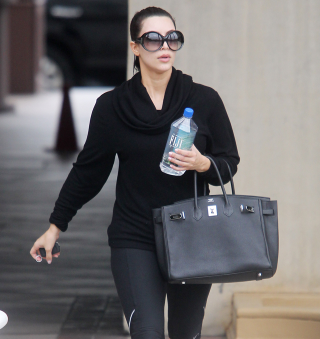 Kim Kardashian wearing Hermes So Black Birkin 35 bag Celine Matrix Top  Heavy sunglasses. Kim Kardash…