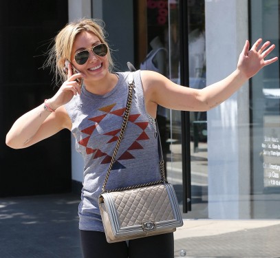 Hilary Duff is as Excited About Her Chanel Boy Bag as We Are PurseBlog