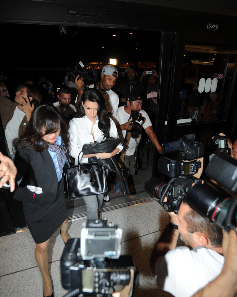 Kim Kardashian Clutches Her Trusty So Black Birkin in a Paparazzi