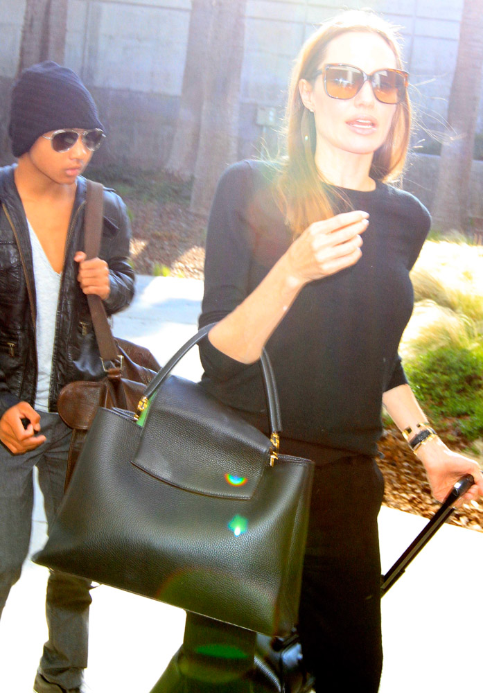 The Many Bags of Angelina Jolie - PurseBlog  Louis vuitton metis,  Celebrity bags, Louis vuitton handbags outlet