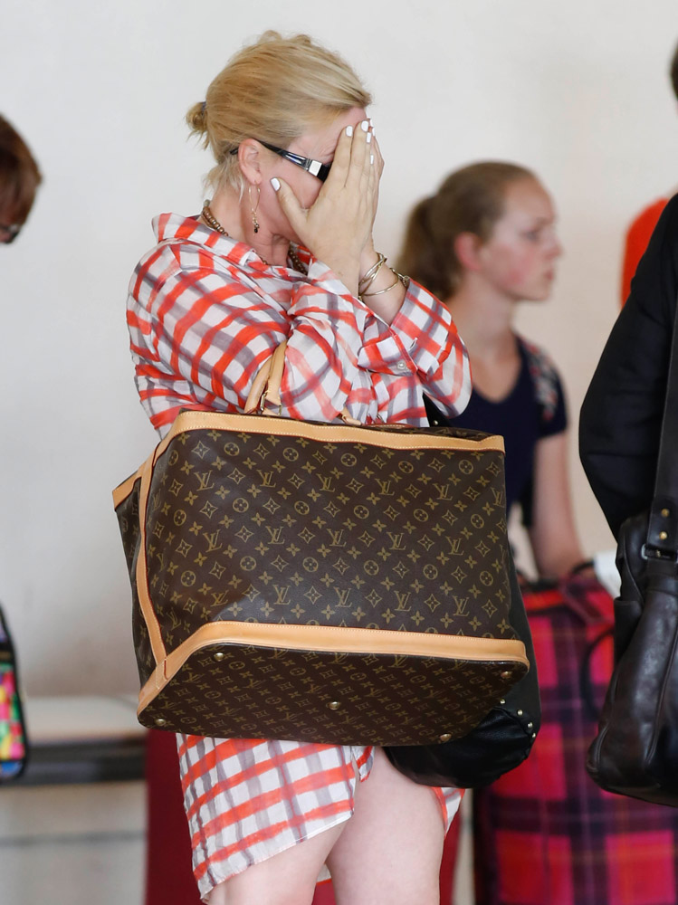 Celebs Flock Through LAX and Rep Their Teams with Bags from Louis