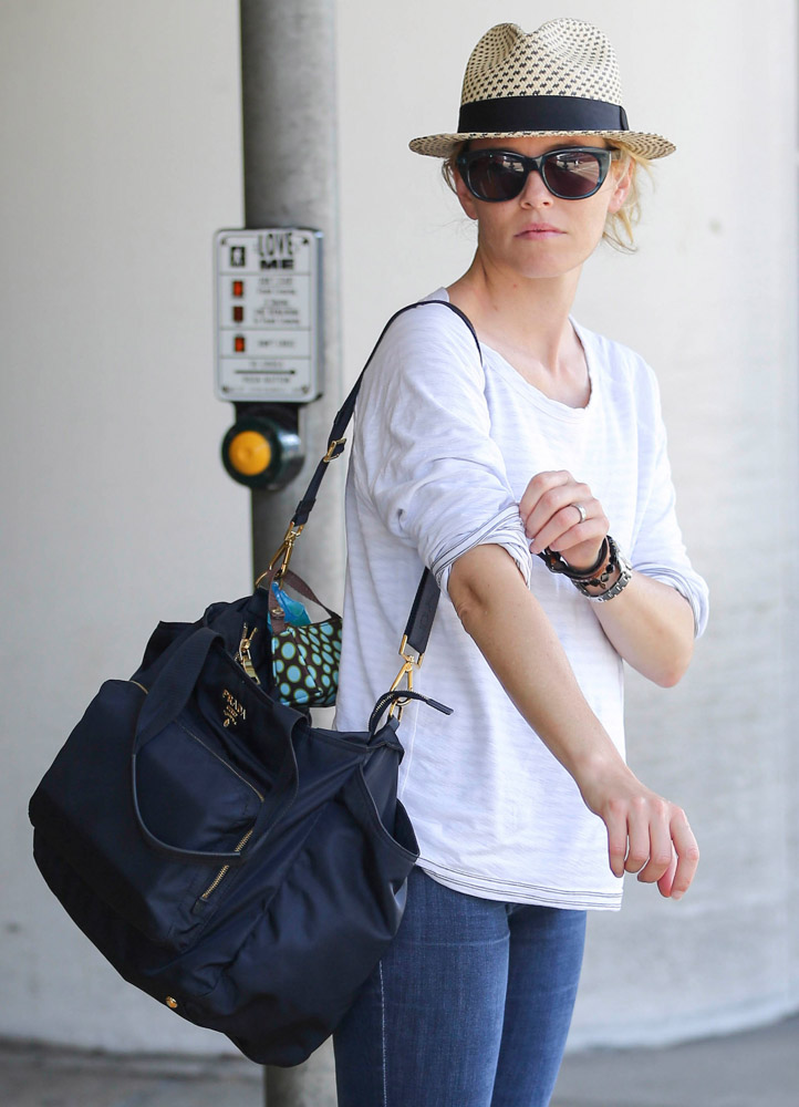 Celebrities Carrying Handbags at the Airport