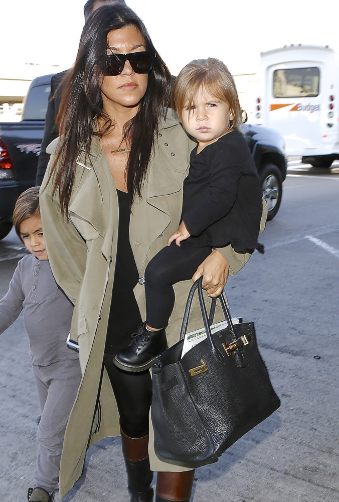 Kourtney Kardashian carries designer diaper bag but all eyes are