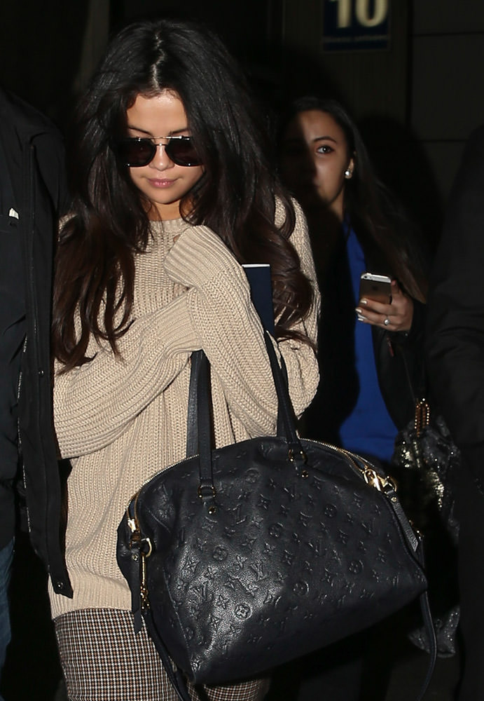 Selena Gomez with Louis Vuitton Empreinte Bag - Spotted Fashion
