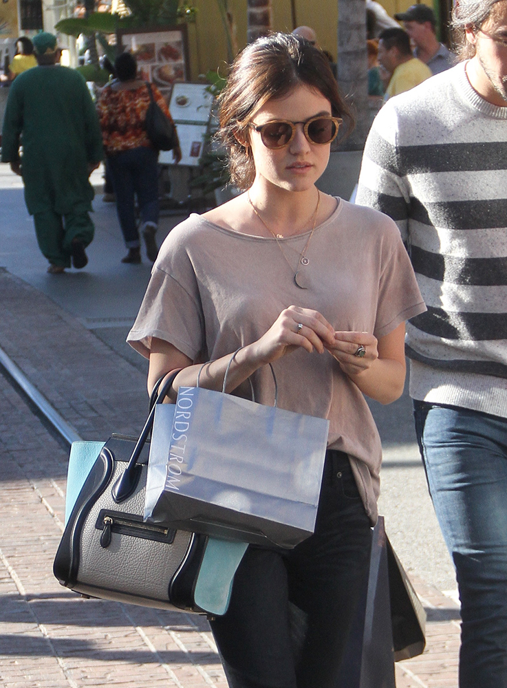 Celebs Holiday Shop While Carrying Bags from Chanel, Céline, and