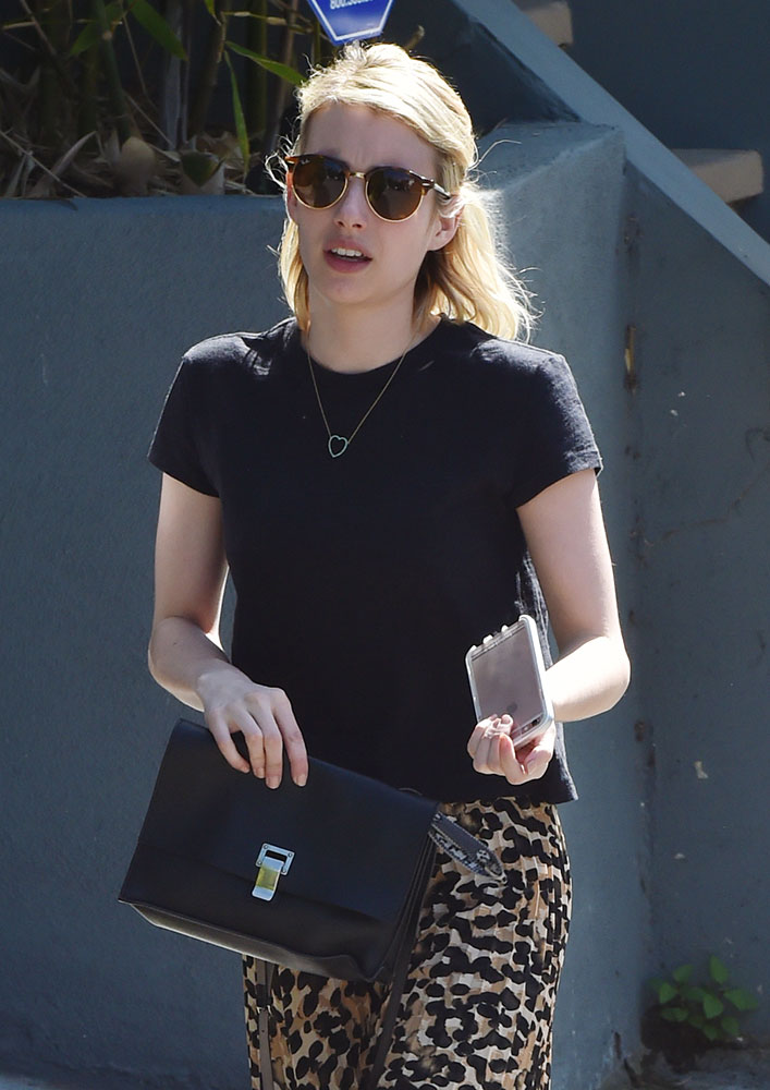 Emma Robert carrying a Gucci Soho Disco bag