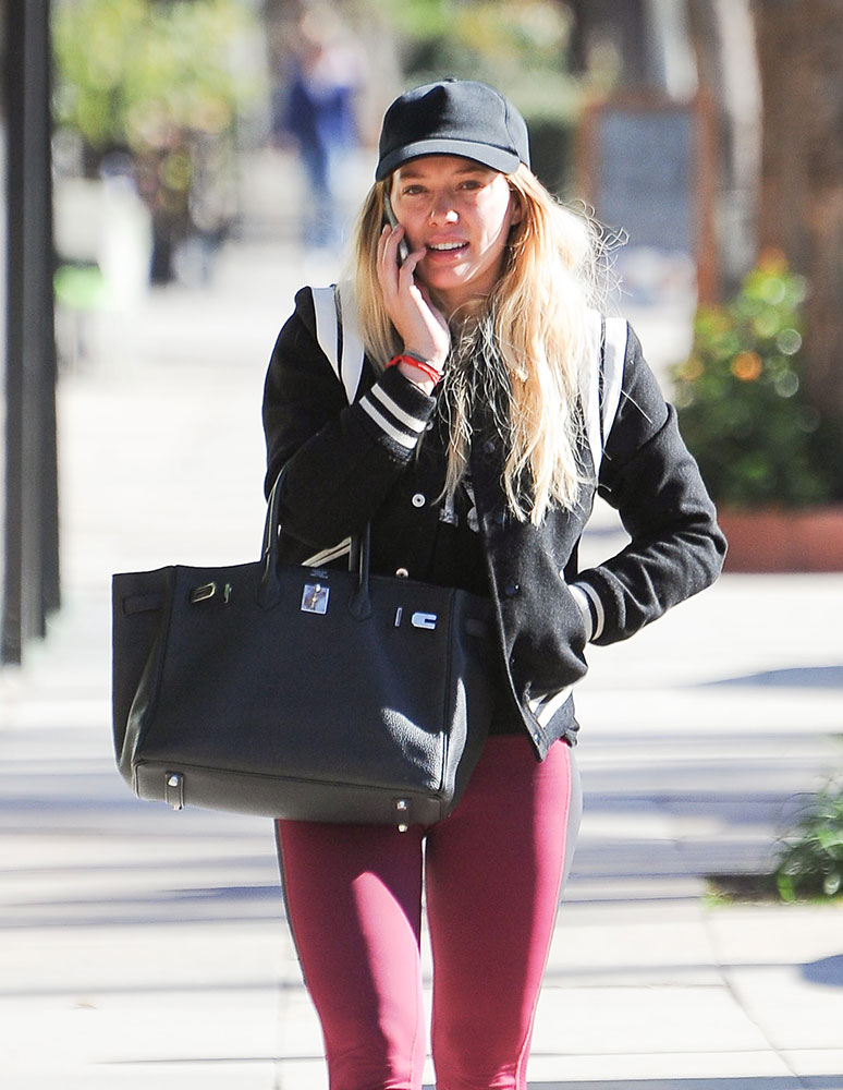Hilary Duff Doubles Up with Bags from Louis Vuitton and Goyard