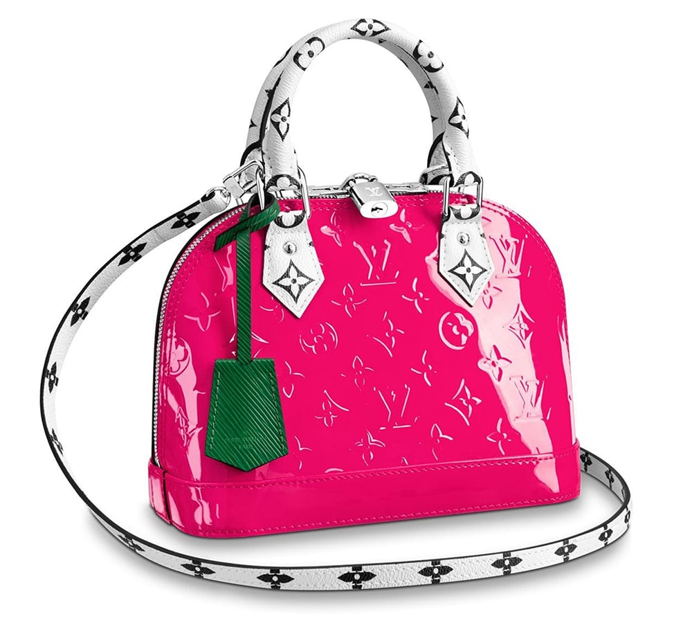 Download An ultra-chic Louis Vuitton Pink handbag for the style conscious.  Wallpaper