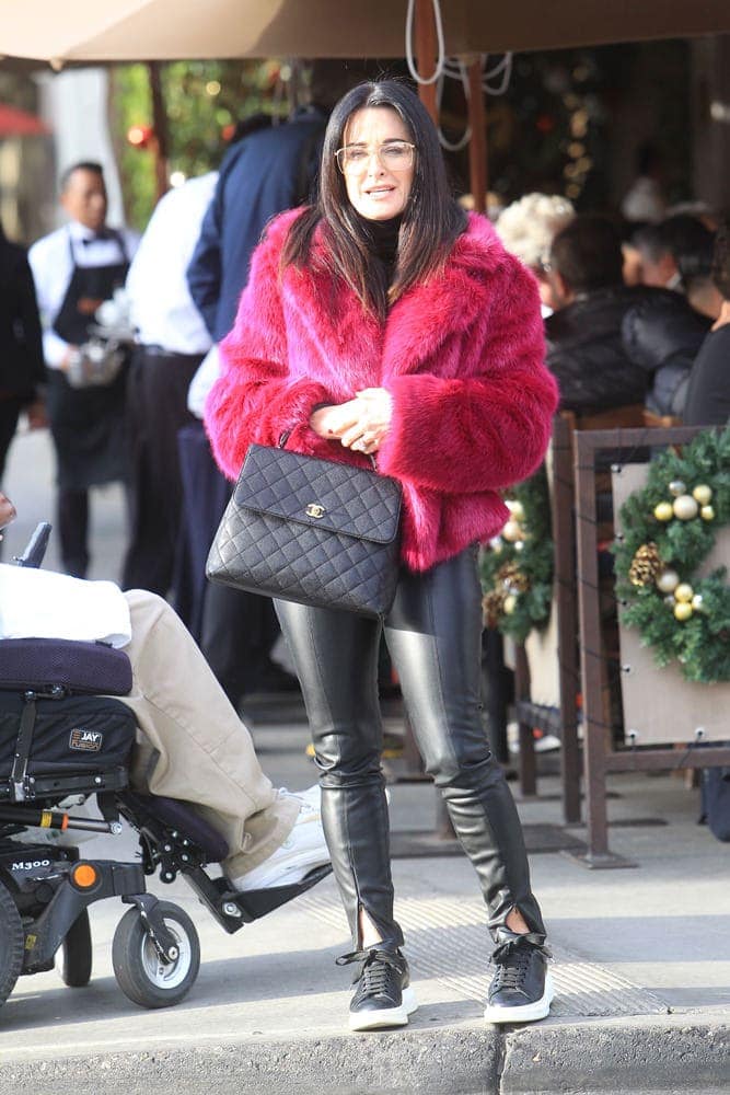 Erika Girardi Gets Neon Red, Pink Louis Vuitton Duffle Bag