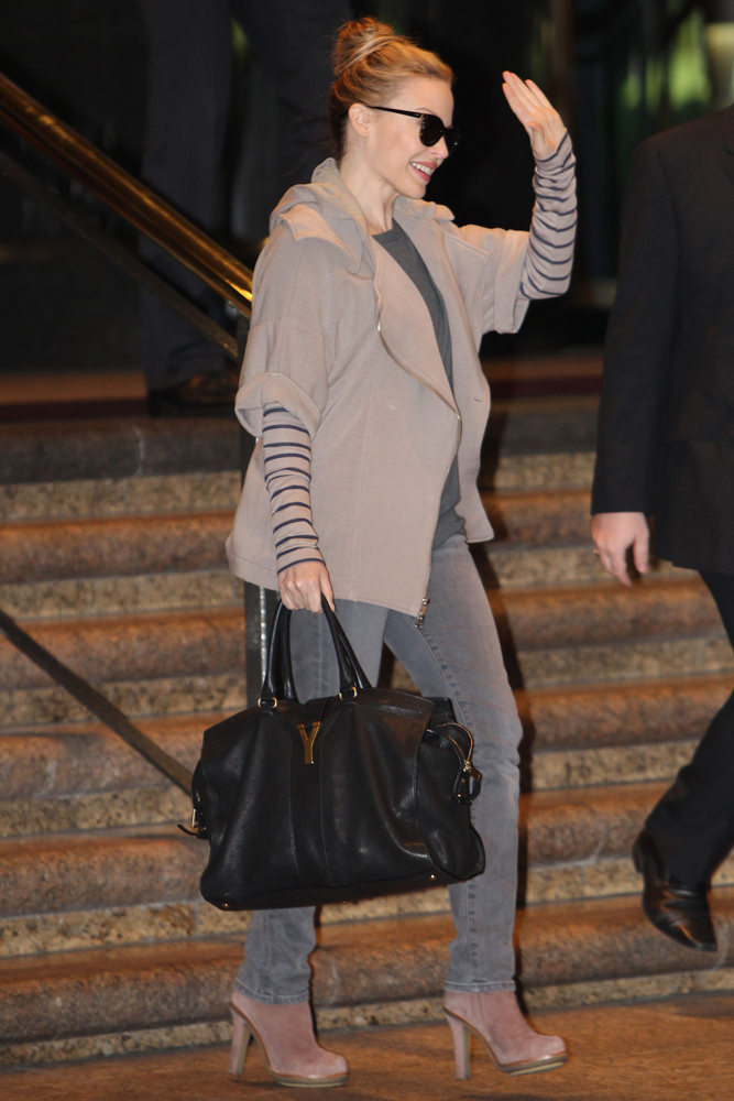 Angelina Jolie Travels with Saint Laurent - PurseBlog