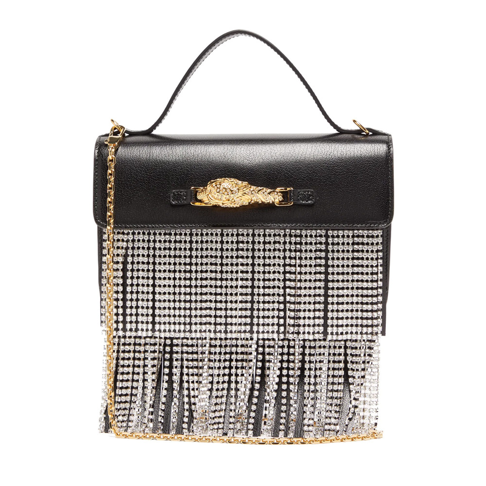 No better accessory for any day than our fringed Louis Vuitton! #boho # fringe