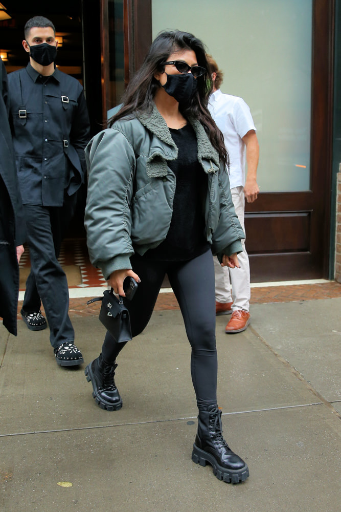 Kourtney Kardashian's Biker Shorts and Louis Vuitton Bag Look for