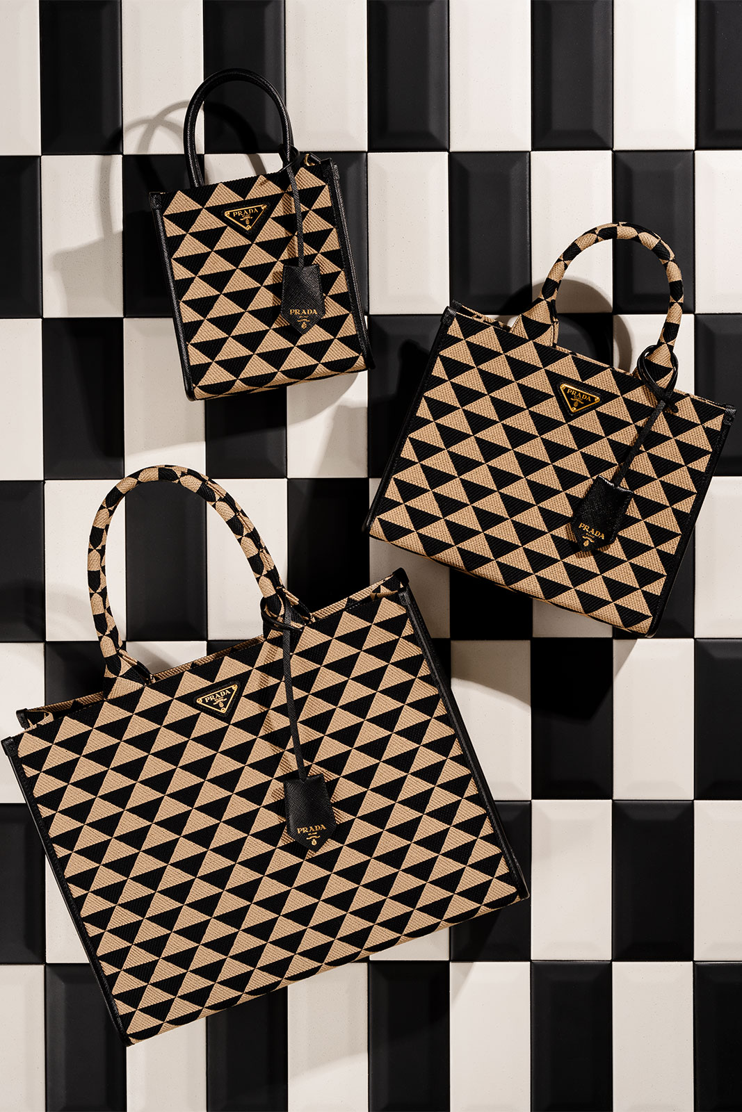 Hippochi on Instagram: Prada Symbol Triangle Pattern Bag Now