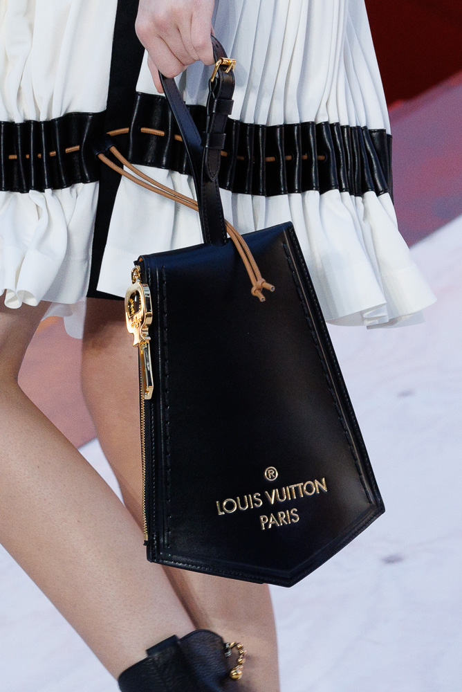 Louis Vuitton® Pochette Métis East West Black Beige. Size in 2023