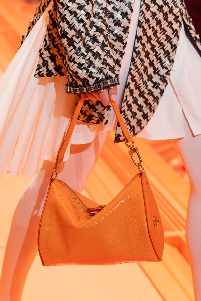 SWIPE] New Handbags of Louis Vuitton Spring/Summer 2024 Louis Vuitton  Spring/Summer 2024 Bags made an orange splash down the runway this…