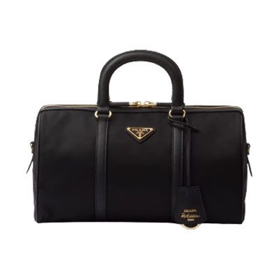 Prada Re Edition 1978 medium Re Nylon and Saffiano leather top handle Pink bag removebg preview