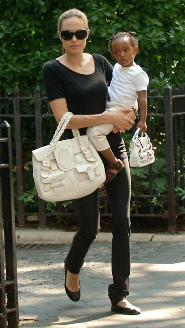 Angelina Jolie Goes Holiday Shopping With Daughter Zahara Wearing a  Valentino Bag