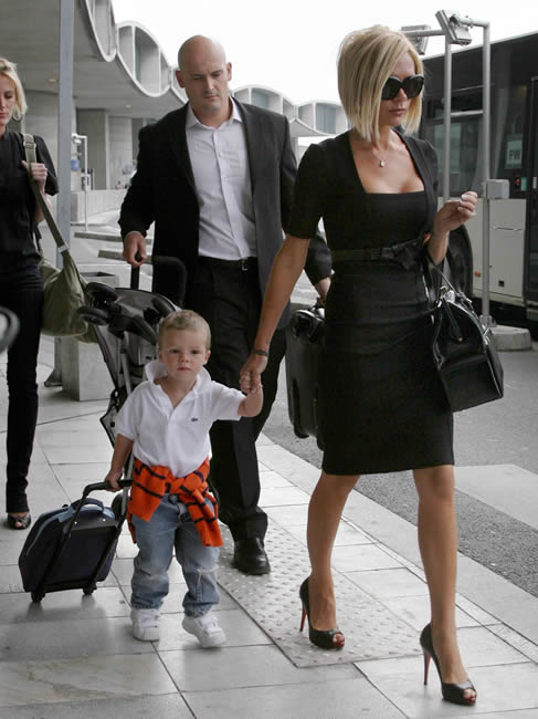 David and Victoria Beckham Leave Paris with Louis Vuitton Luggage -  PurseBlog